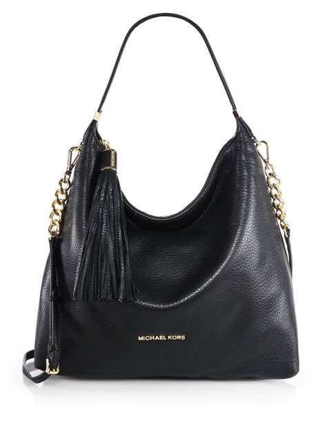 michael kors black side purse|Michael Kors black shoulder bag.